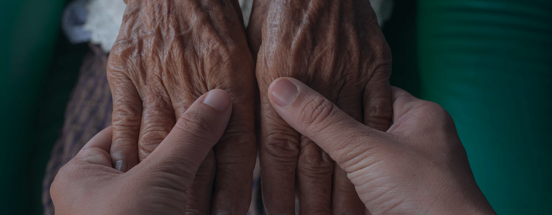 Parkinson's disease stages, where an elderly woman is experiencing hand pain associated with motor symptom progression.